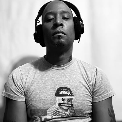 a black and white photo of a person wearing headphones, stranjwayz